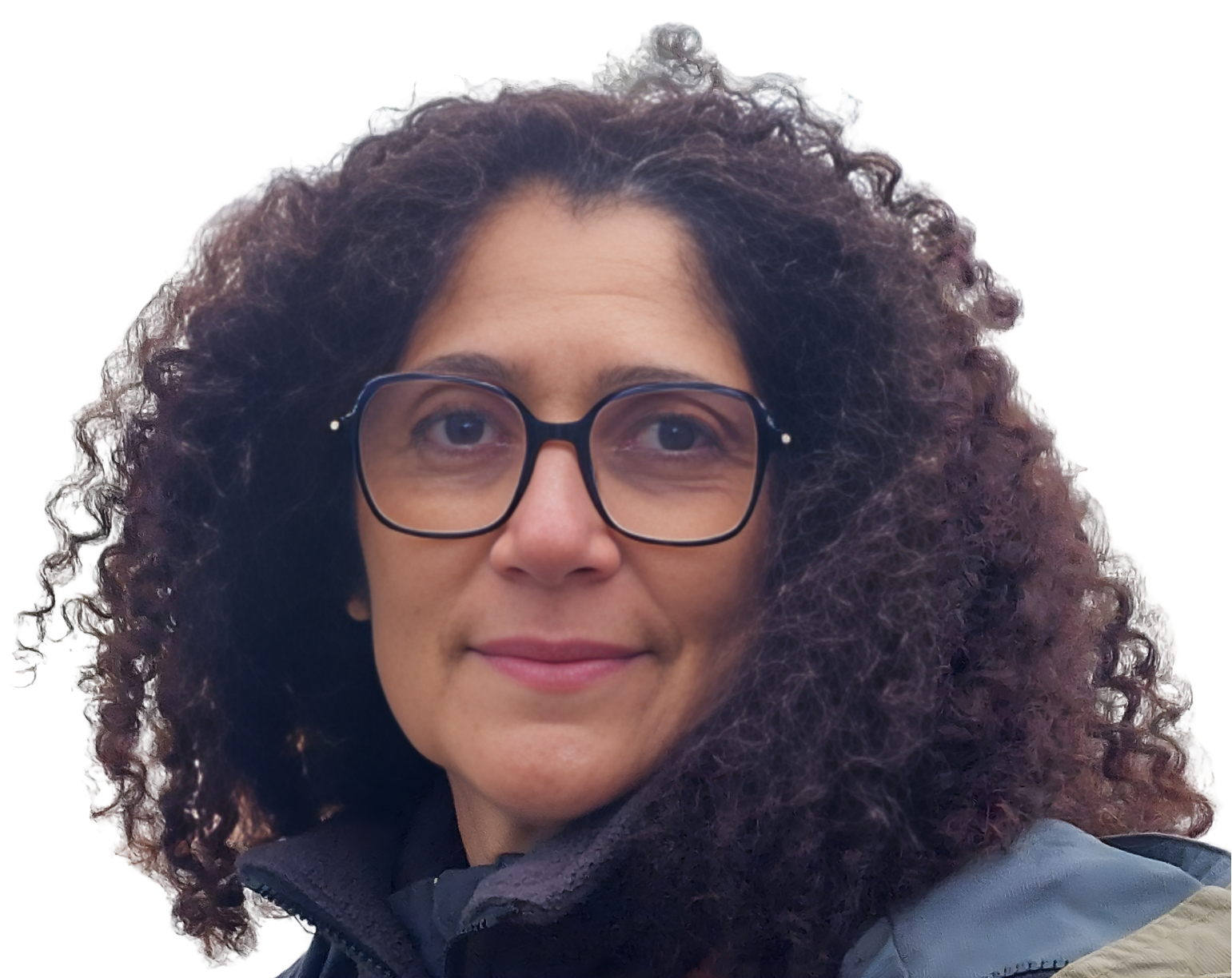 smiling woman standing while holding orange folder